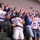 Illustration for article titled A Thrashers Fan Surrounded By Winnipeg Jets Fans At The Draft Tries To Mask His Pain With Smiles, Beers